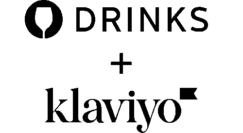 A person sits in a field of flowers, reading a book beneath mountains and clouds—perhaps reflecting on insights from the Direct to Consumer Wine Symposium.